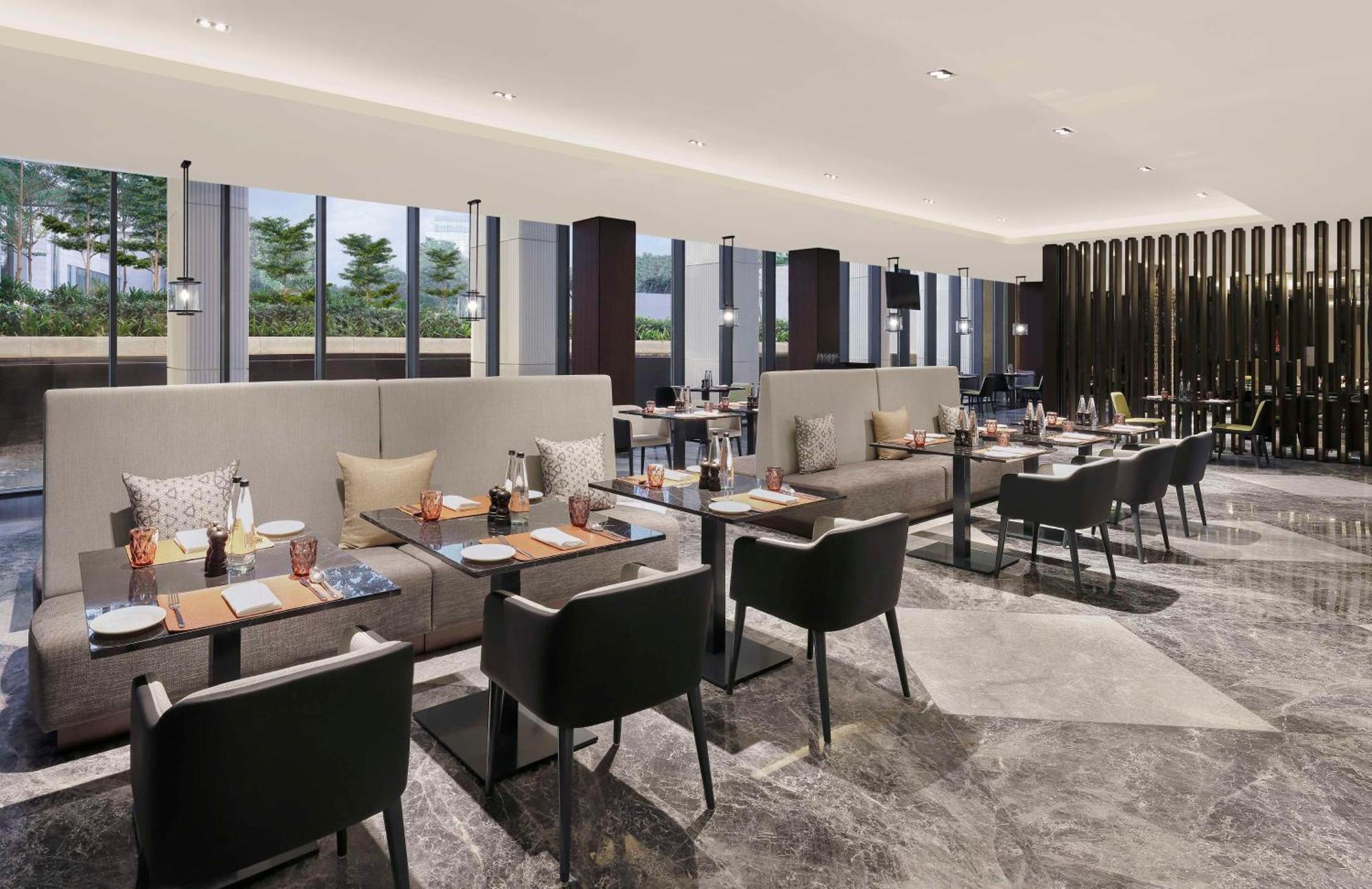 Hilton Bengaluru Embassy Manyata Business Park Hotel Buitenkant foto